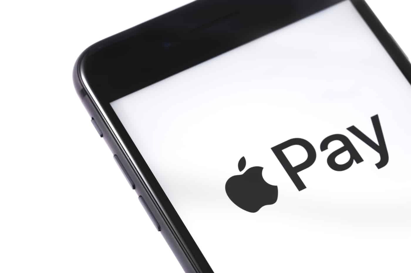 High-res image: smartphone showing Apple Pay logo. Use it with Coinmama to buy crypto easily.