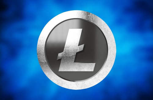 A metallic Litecoin logo against a blue backdrop—ideal for those looking to buy crypto on Coinmama.