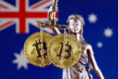 A blindfolded Lady Justice with Bitcoin scales and Australian flag, representing buying crypto with Coinmama.